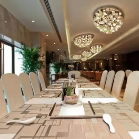 Li Cai Tian Qi Hotel Xianyang Exterior foto