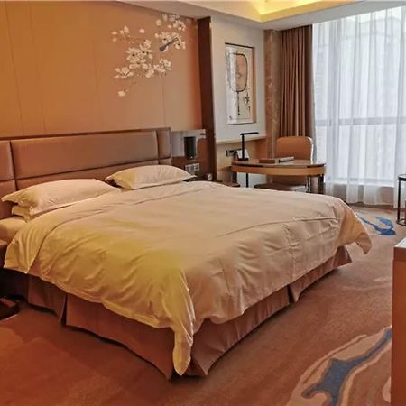 Li Cai Tian Qi Hotel Xianyang Exterior foto